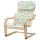 Un fauteuil POÄNG pour enfants avec un coussin à pois blancs, verts et jaunes. Il est fait de bois, de tissu et a un design léger et incurvé pour plus de confort.