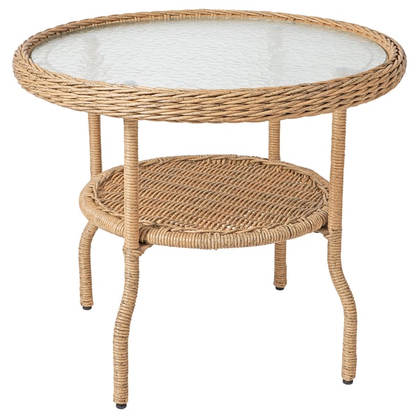 Table d’appoint RISHOLMEN : plateau en verre beige, osier et transparent, ronds, pieds ondulés, résistant aux intempéries.