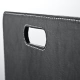 Organisateur de bureau noir avec poignée robuste et coutures raffinées, parfait pour ranger les essentiels.