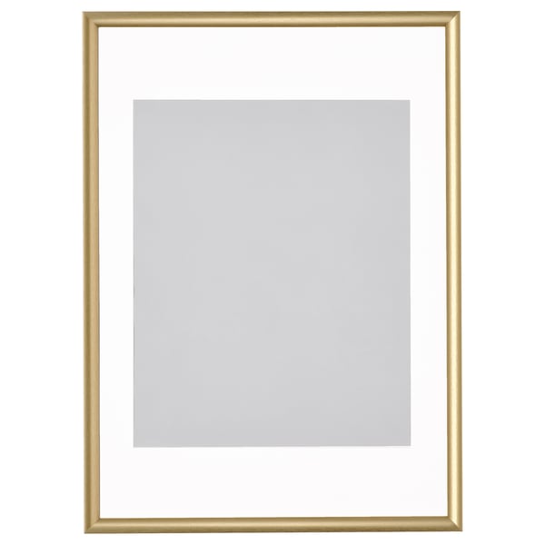 Cadre photo doré vide, rectangulaire, avec fond gris.