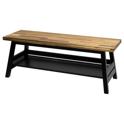 Banc en acacia massif SKOGSTA, plateau en bois naturel, pieds noirs, étagère de rangement.
