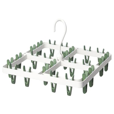 Représente un cintre à linge SLIBB blanc avec 24 pinces à linge vertes.