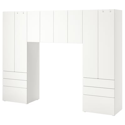 Un ensemble de rangement SMÅSTAD blanc composé d’armoires et de tiroirs au design moderne et minimaliste.