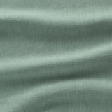 Tissu vert doux et texturé avec un éclat subtil, probablement une housse de canapé durable et lavable en machine.