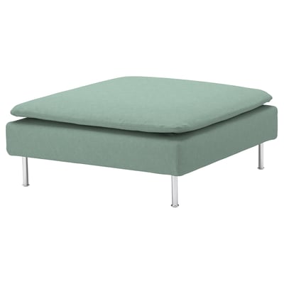 Un pouf carré vert, recouvert d’un mélange de coton et de polyester, sur quatre pieds en métal.