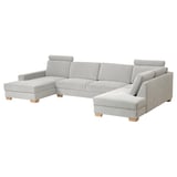 Cette image montre un canapé d’angle moderne en tissu gris clair SÖRVALLEN au design scandinave, doté d’une chaise longue et de pieds en bois.