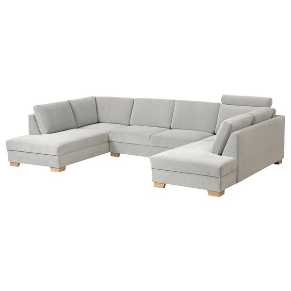 Canapé gris en forme de U SÖRVALLEN, design minimaliste moderne, pieds en bois clair, coussins confortables.