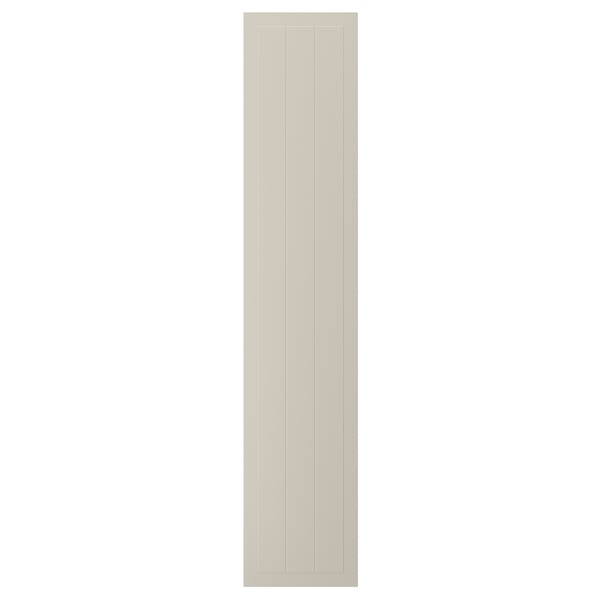 Une porte d’armoire STENSUND beige avec des panneaux rainurés de forme rectangulaire.