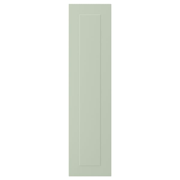 Une grande porte d’armoire rectangulaire verte avec un design de panneau rainuré.