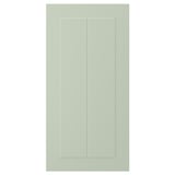Une porte d’armoire verte STENSUND avec des panneaux rainurés, en panneaux de fibres et peinture polyuréthane, de forme rectangulaire avec un design élégant.