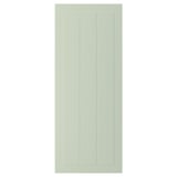 Une porte d’armoire STENSUND verte avec un design de panneau rainuré, en panneau de fibres avec une finition lisse et facile à nettoyer.