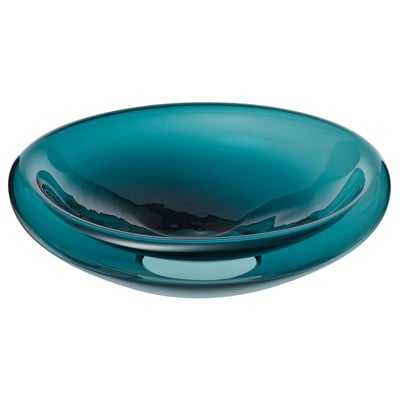Bol en verre bleu-turquoise fabriqué à la main, de forme organique.