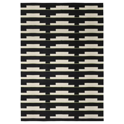 Tapis géométrique noir et blanc, tissé à la main, réversible, laine et coton.