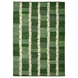 Un tapis en laine vert tissé à la main avec un motif de bouleau, réversible, de la collection Stockholm.