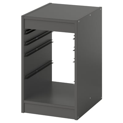 Une unité de rangement grise ikea TROFAST avec plusieurs compartiments ouverts pour organiser les articles.