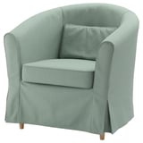 Fauteuil Ikea TULLSTA vert clair au design rond élégant, au tissu doux et aux pieds en bois.