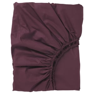 Un drap-housse marron avec des bords élastiques, en coton et lyocell. Il a une surface nette et lisse, conçue pour les matelas jusqu’à 26 cm d’épaisseur.