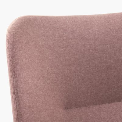 Gros plan du dossier rembourré brun rosé, mettant en valeur des lignes douces et un tissu de qualité.