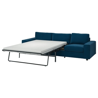 Canapé-lit VIMLE bleu, design moderne avec matelas épais et confortable, convertible facilement.