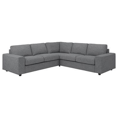 Le canapé sectionnel VIMLE en gris, doté d’un design moderne avec des coussins moelleux et d’un aspect confortable et accueillant.