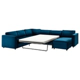Canapé-lit sectionnel VIMLE sarcelle au design moderne et élégant, doté d’un revêtement en velours d’une couleur profonde et moelleuse.