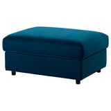 Pouf en velours bleu VIMLE, forme carrée avec rangement, pieds en bois foncé.