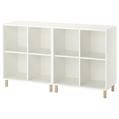 Witte EKET stellingkast met zes vakken en vier houten poten.