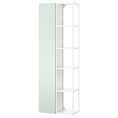 ENHET wandmeubel: lichtgroen, witte planken, metalen hardware, open & gesloten opslag.