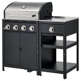 Moderne zwarte gasgrill met zijbrander, vier roestvrijstalen branders en opbergplanken. Ideaal om buiten te koken.
