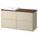 Een HAVBÄCK beige badkamermeubel met een houten aanrecht en een wit keramisch wasbakje.