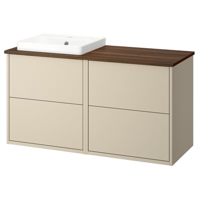 Een HAVBÄCK beige badkamermeubel met een houten aanrecht en een wit keramisch wasbakje.