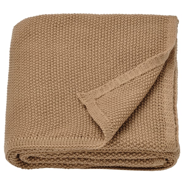Gevouwen beige HUMLEMOTT deken, gebreid, zacht, gerecycled polyester.