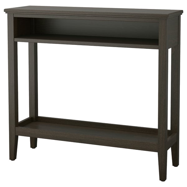 Een donkerhouten IDANÄS consoletafel met een rechthoekig blad, centrale open opbergruimte en een onderste plank. Elegant en functioneel voor smalle ruimtes.