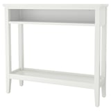 Witte IDANÄS consoletafel met plank en open bodem.