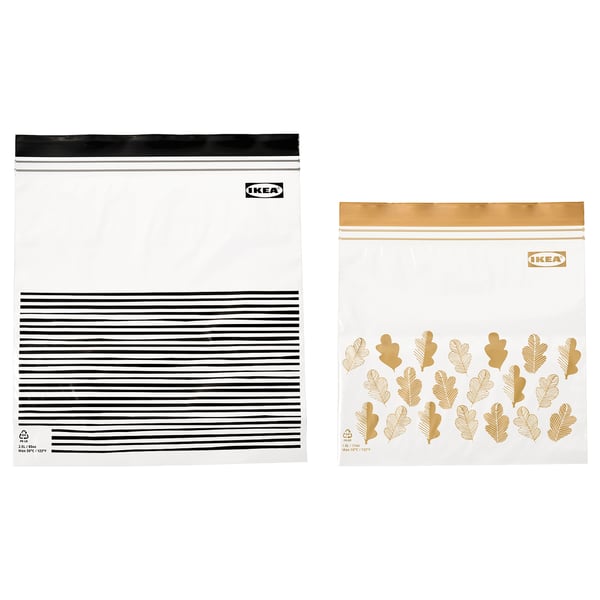 Ikea ISTAD hersluitbare zakken - helder, rechthoekig, met zwarte en gouden strepen of bladontwerpen, gemaakt van polyethyleen plastic.
