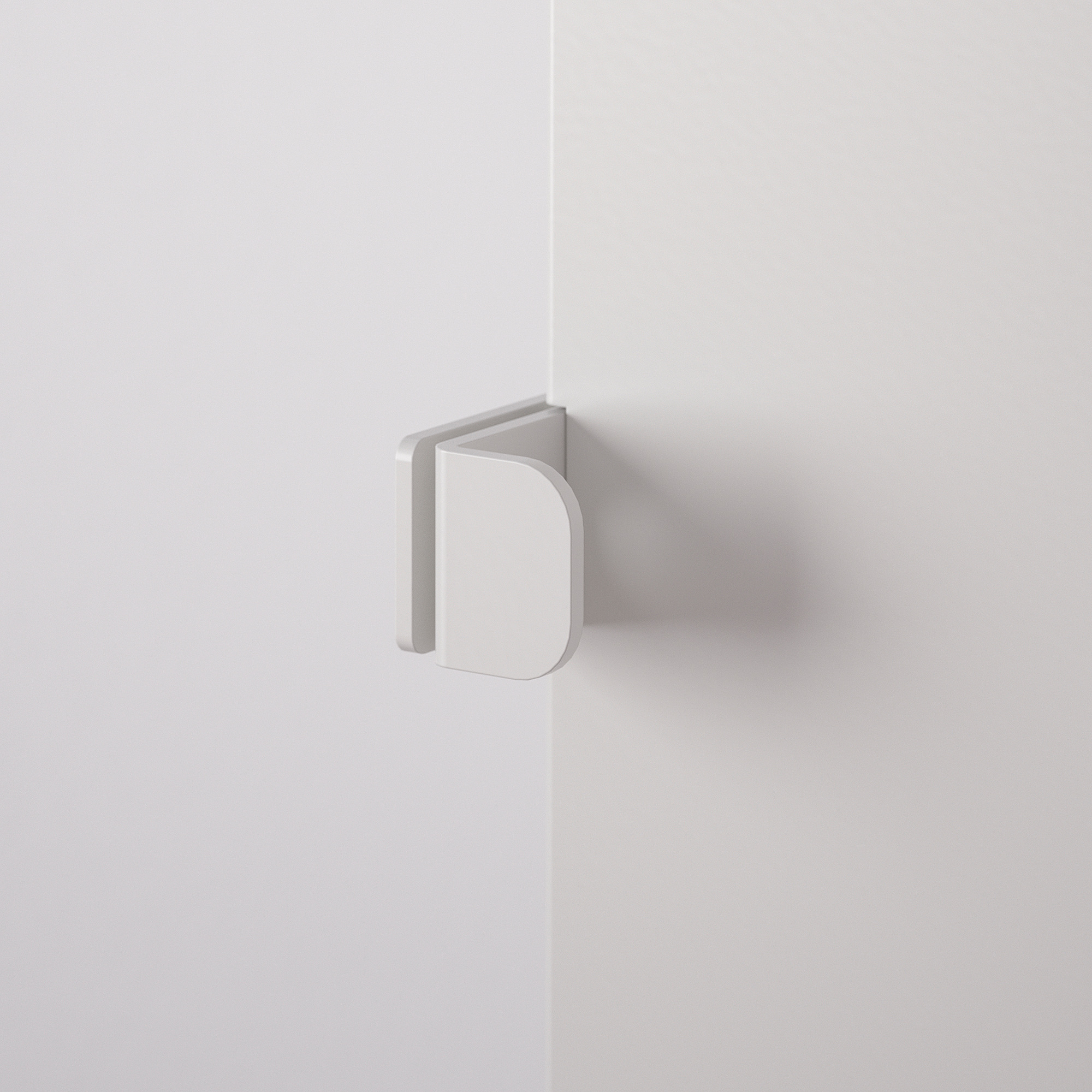 Wit metalen deurscharnier gemonteerd op muurhoek, minimalistisch design.