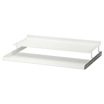 Wit KOMPLEMENT metalen schoenenrek met twee lagen en uittrekbaar ontwerp.