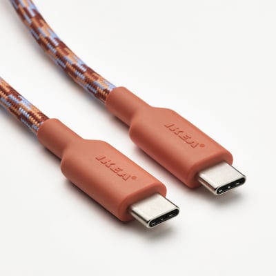 LILLHULT usb-c-kabel in oranjeblauw, geweven uitvoering met rubberen connectoren.