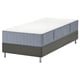 Modern bed met grijze LYNGÖR-matras, met 7 comfortzones op een grijze basis.