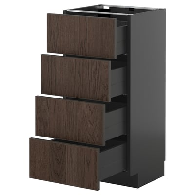 Modern donkergrijs keukenblok met vier donkerbruine houten lades.