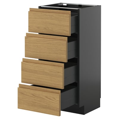 Modern zwart keukenblok met vier houten lades.