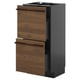 METOD keukenblok: donkerbruine houten lades, zwarte kast, modern design.
