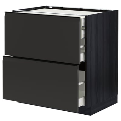 Modern zwart keukenmeubel met strakke handgrepen en twee grote lades.