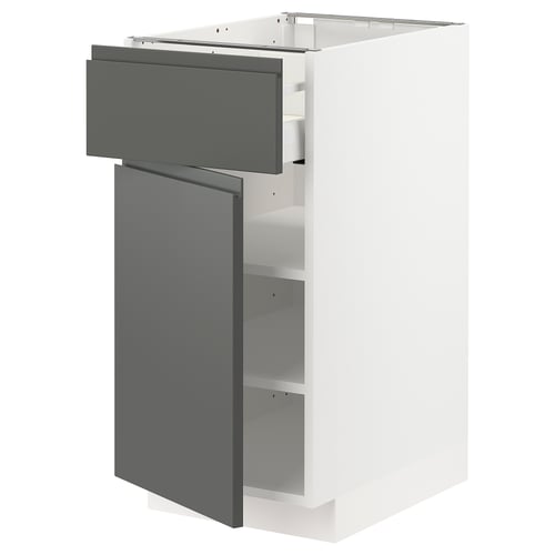 Modern grijs ladeblok, witte kast, geïntegreerde handgrepen, strak design.