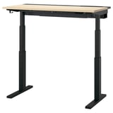 Modern zwart sta-bureau met licht houten blad, verstelbaar.