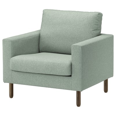 De SALTSJÖBADEN is een lichtgroene, moderne fauteuil. Het ontwerp heeft een hoekige vorm met houten poten, wat zorgt voor een comfortabele en stijlvolle zitplaats voor elke kamer.