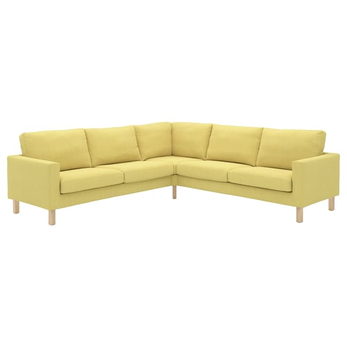 Een limoengroene IKEA SALTSJÖBADEN hoekbank met lichte houten poten, met een rechthoekige vorm en minimalistisch ontwerp.