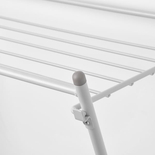 Close-up van de witte verbinding van het metaalkleren drogende rek; Toont duurzame constructie en veilige verbinding.