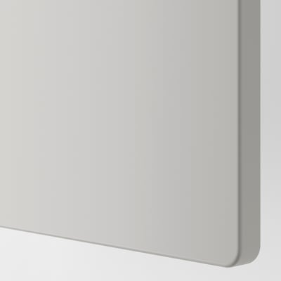 Close-up van gladde, witte, moderne opslageenheidsdeur. Zachte, afgeronde hoeken voor de veiligheid.