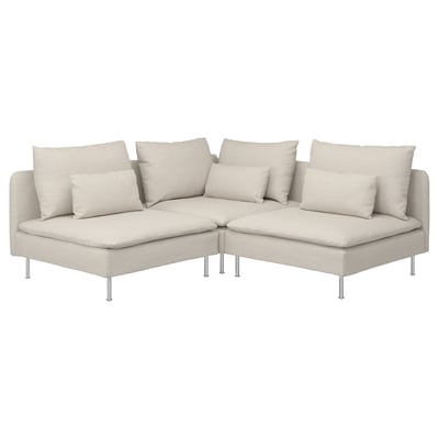 Moderne beige sectionele bank met 8 kussens en metalen poten. Diepe zittingen, lage rugleuning en strakke lijnen. Perfect om comfortabel in te loungen.